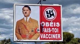 ماکرون با چهره هیتلر روی بیلبورد تبلیغاتی